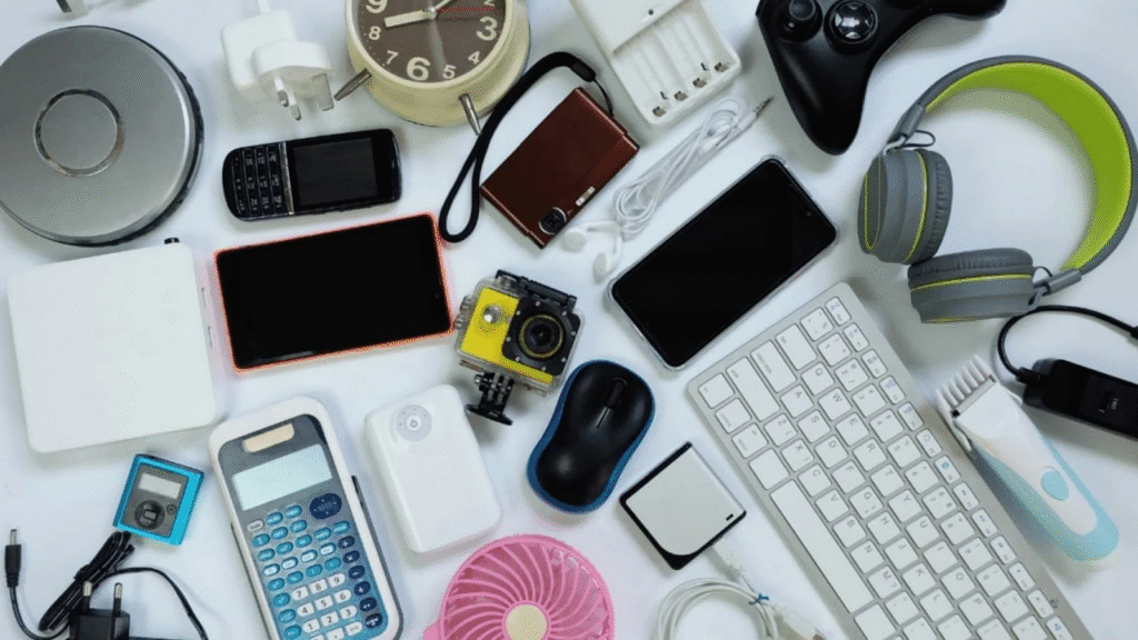Affordable Tech Gifts Everyone Will Love This Holiday Season featuring wireless earbuds, smartwatch, Bluetooth speaker, portable charger, smart home gadgets, and gift boxes.