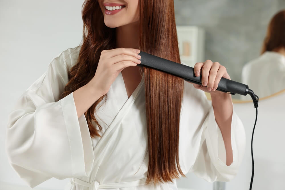 Multi-styler with attachments for curling, smoothing and drying hair